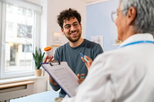 Doctor explaining cholesterol testing for men results during consultation