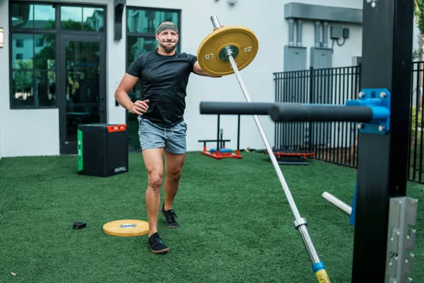 Athlete balancing weightlifting and cardio workouts during training