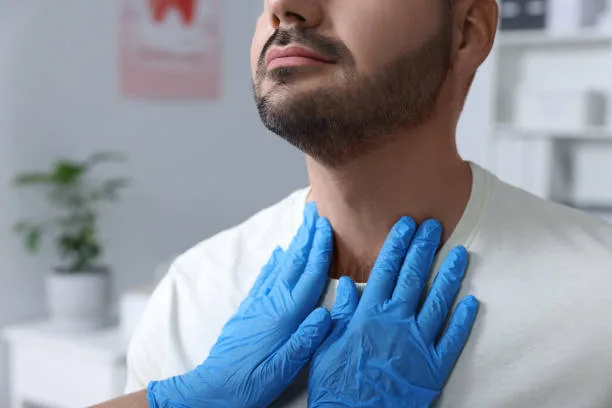 Medical professional explaining thyroid hormone function to a fasting patient